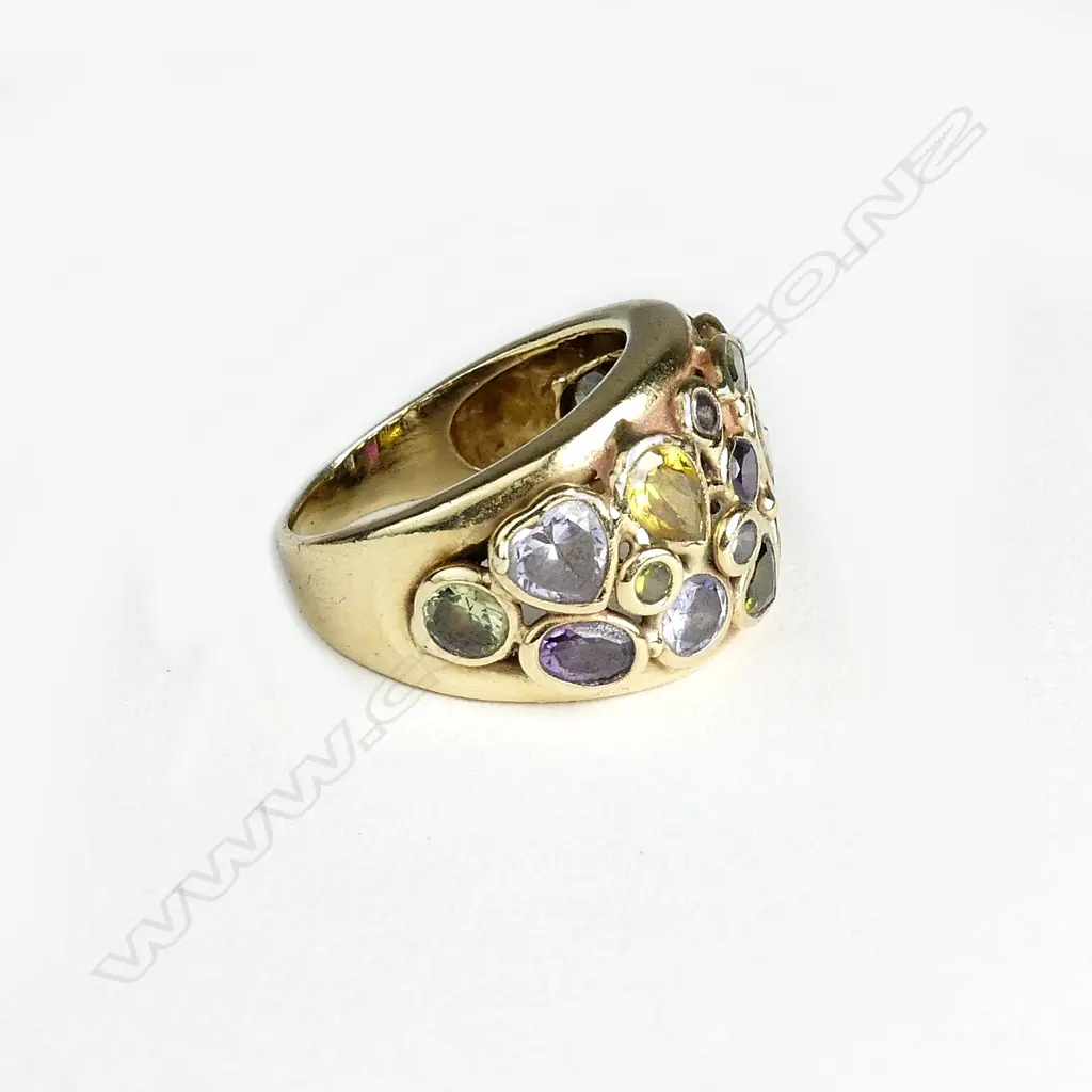 A contemporary 14ct gold and semi-precious stone dress ring Image 1++
