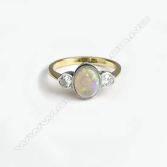 An 18ct gold opal and diamond ring