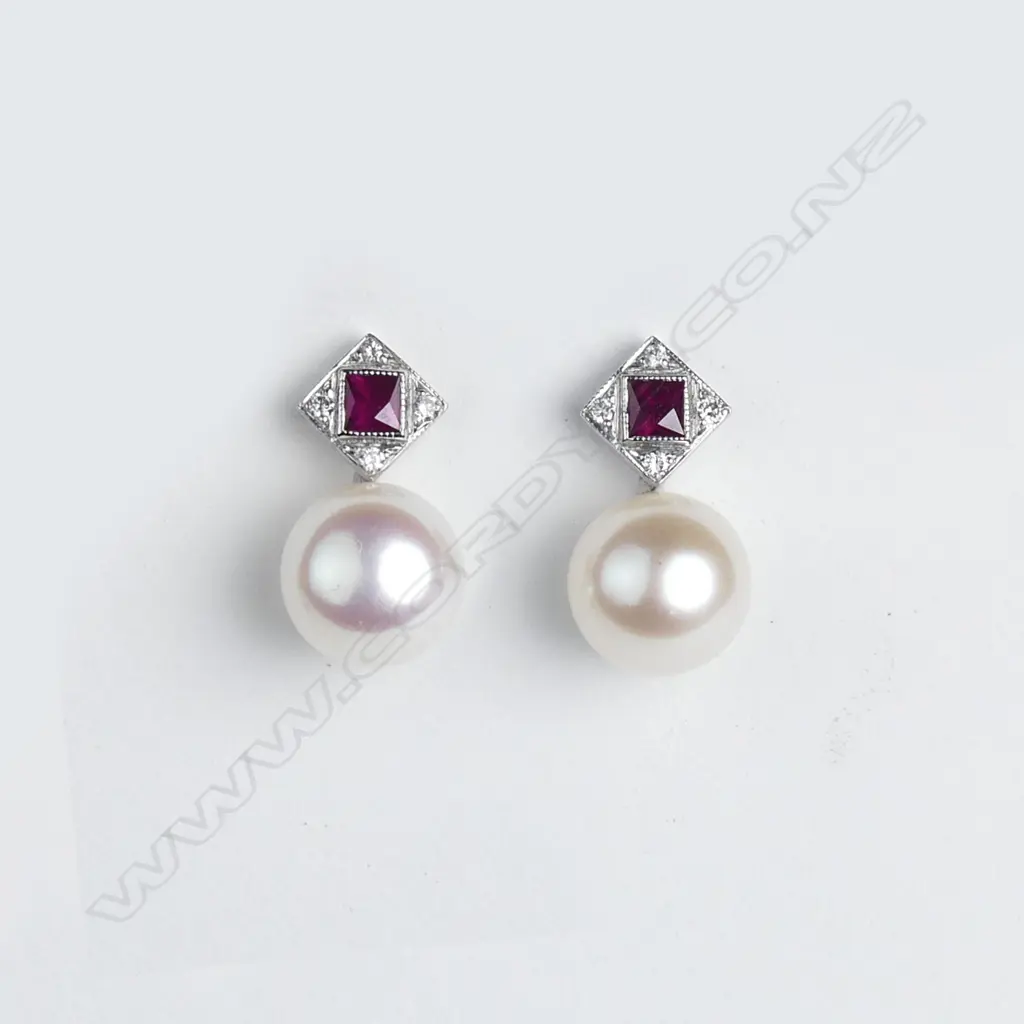 A pair of 18ct white gold diamond ruby and pearl earrings Image 1++