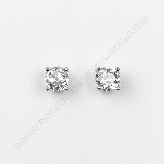 A pair of 18ct white gold and diamond stud earrings