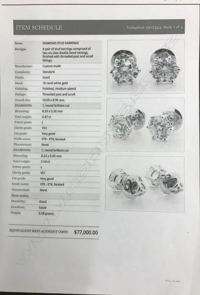 A pair of large and impressive diamond solitaire stud earrings Image 1++