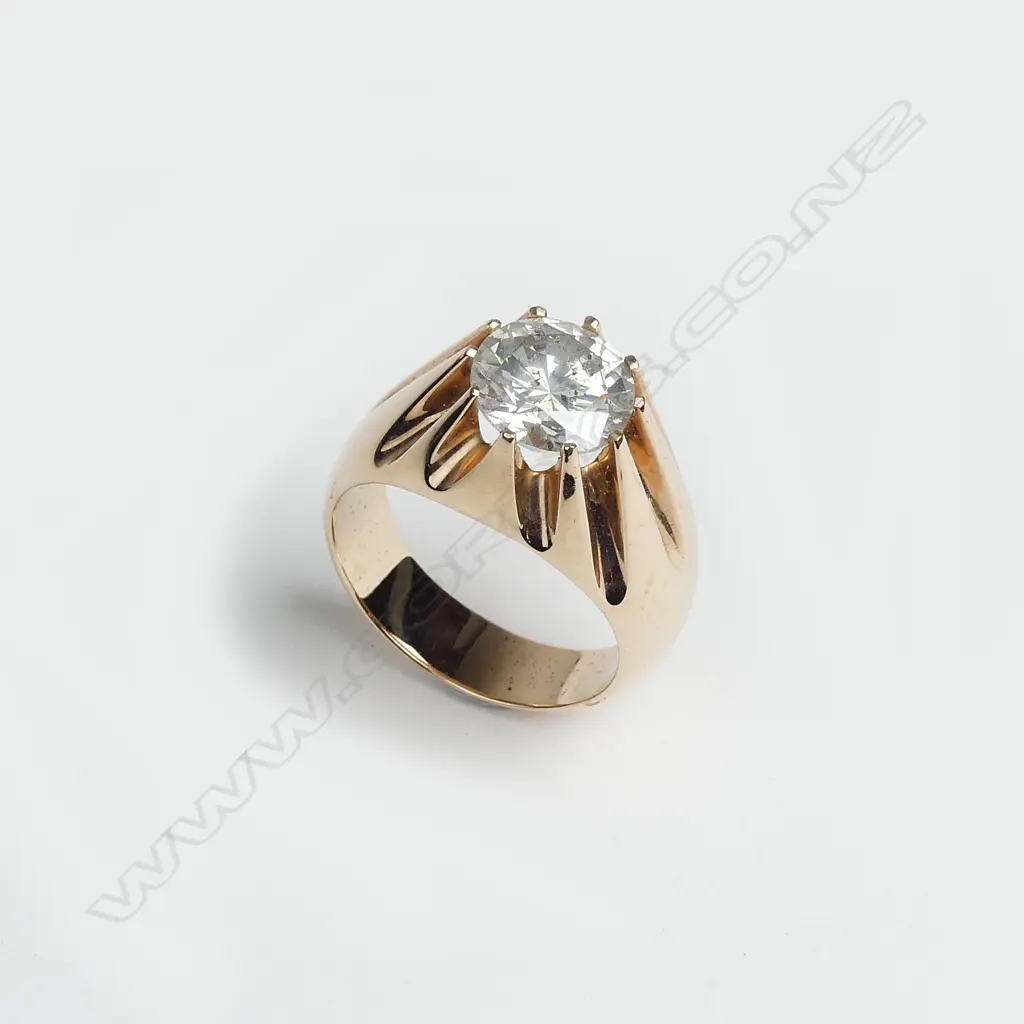 A striking large solitaire diamond gents ring Image 1++