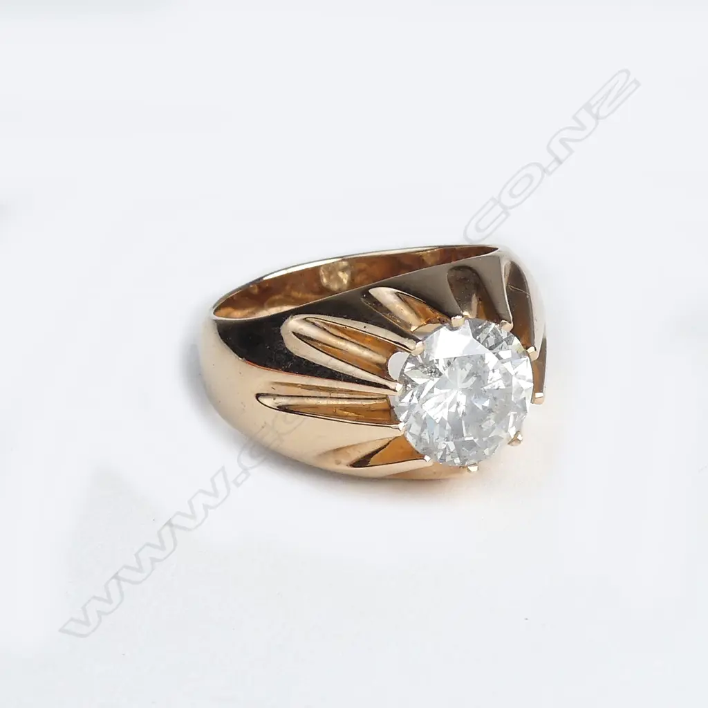 A striking large solitaire diamond gents ring Image 1++
