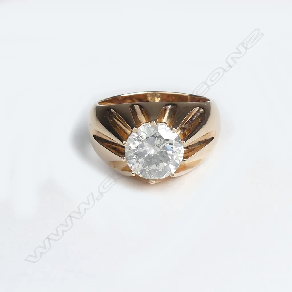 A striking large solitaire diamond gents ring Image 1++