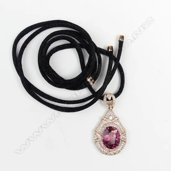 An 18ct rose gold tourmaline and diamond pendant