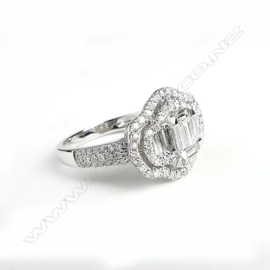 An 18ct white gold and diamond dress ring Image 1++