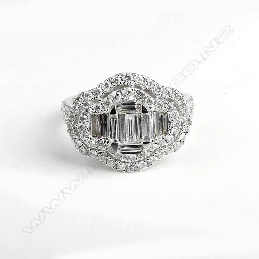 An 18ct white gold and diamond dress ring Image 1++