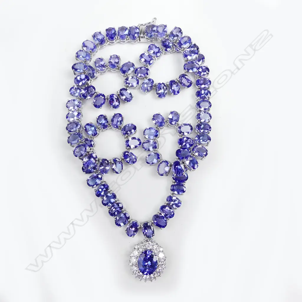 A 14ct white gold tanzanite and diamond pendant necklace Image 1++