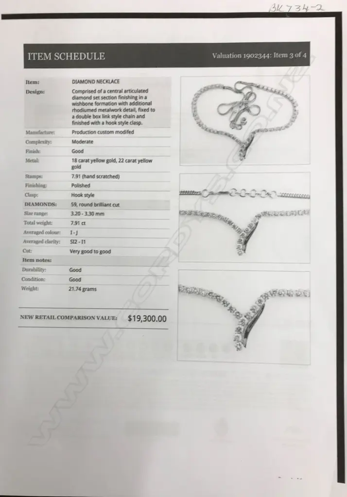 An 18ct gold diamond necklace and earring set Image 1++