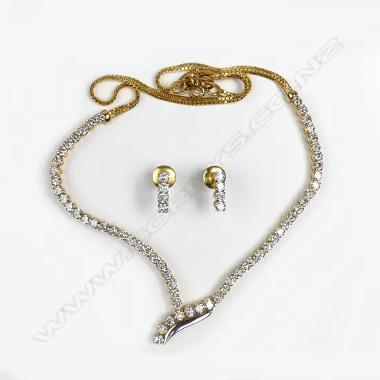 An 18ct gold diamond necklace and earring set