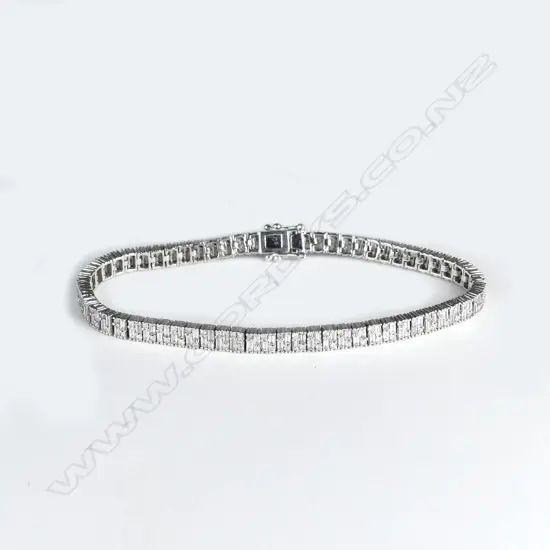 An 18ct white gold multi-diamond tennis bracelet