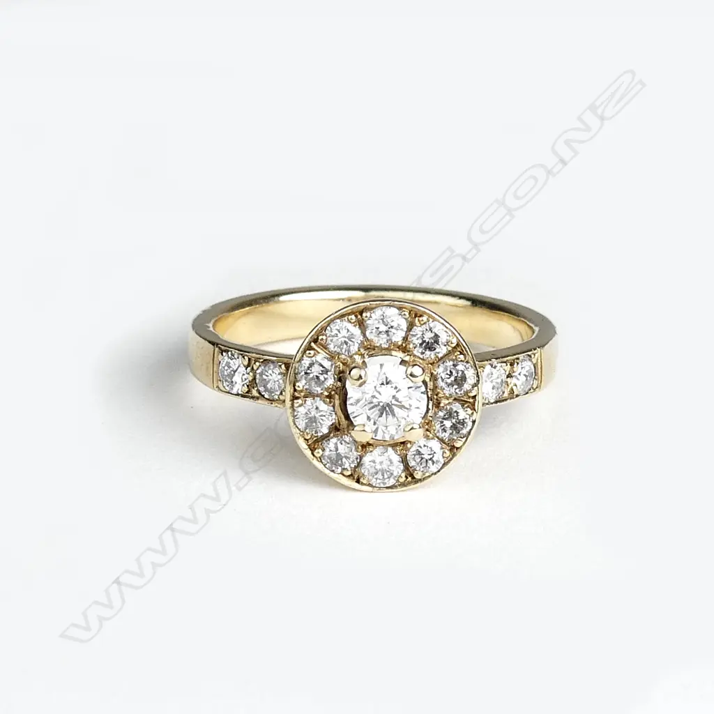 A 9ct gold and diamond ring Image 1++