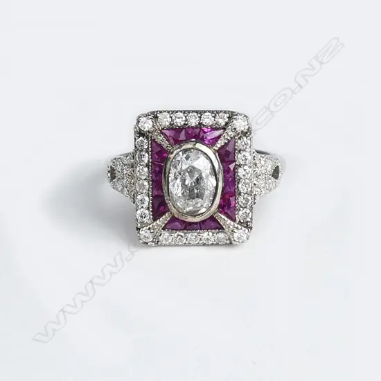 An 18ct white gold diamond and ruby Art Deco style ring