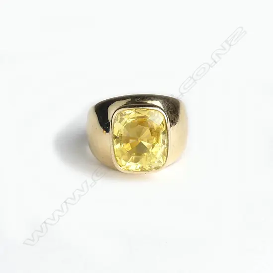 An exceptional natural yellow sapphire dress ring