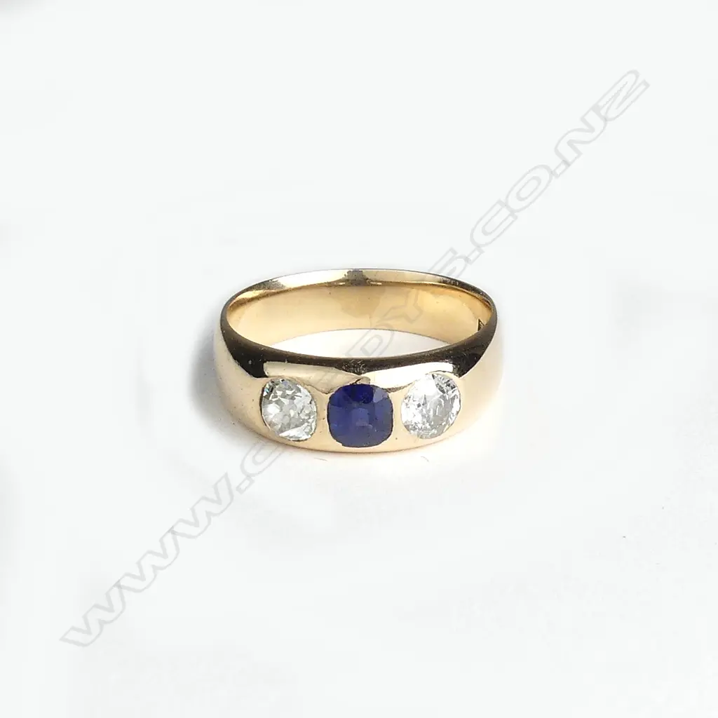 An estate handmade 14ct. yellow gold sapphire and diamond three-stone ring Image 1++