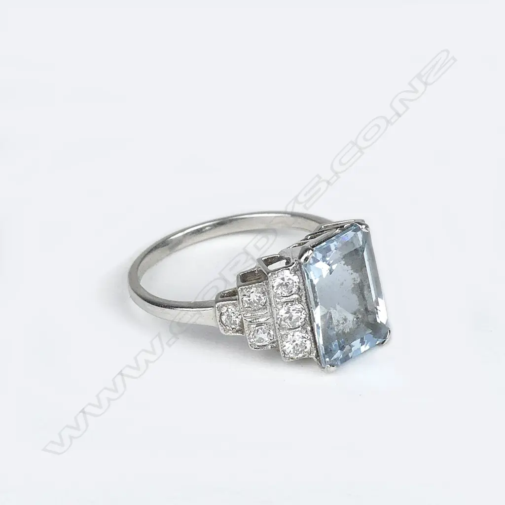 A platinum aquamarine and diamond ring Image 1++
