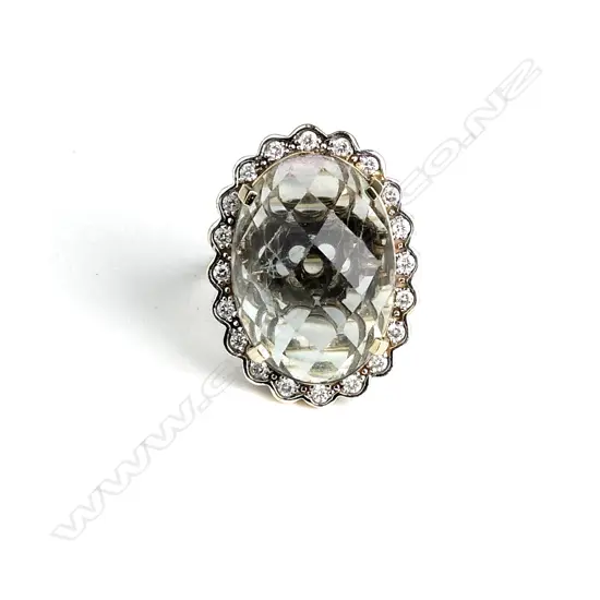 A 9ct gold aquamarine and diamond dress ring