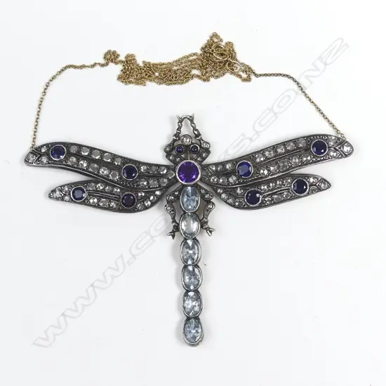 A silver and gold multi gemstone Art Nouveau style dragonfly pendant