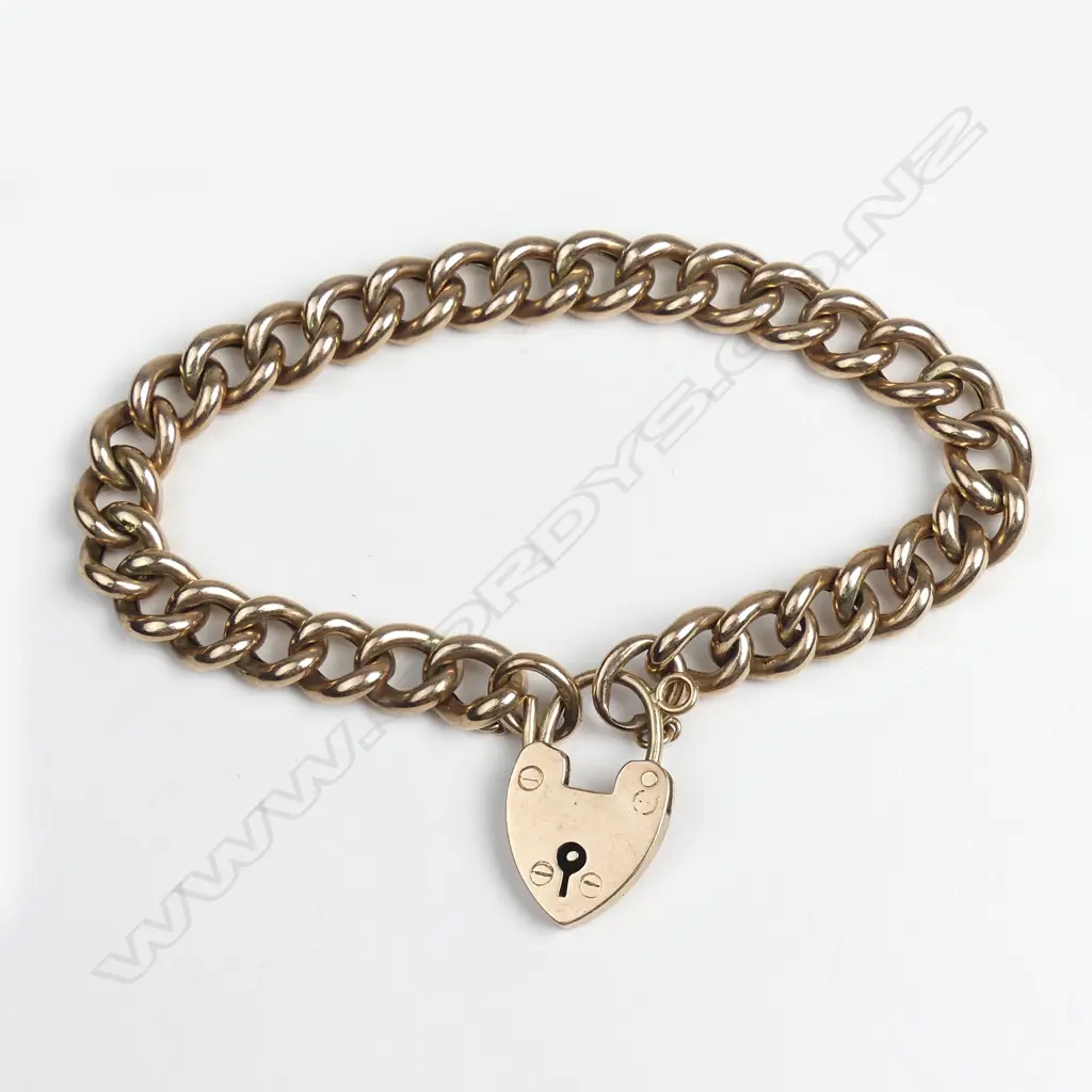 A vintage 9ct. rose gold curb link bracelet Image 1++