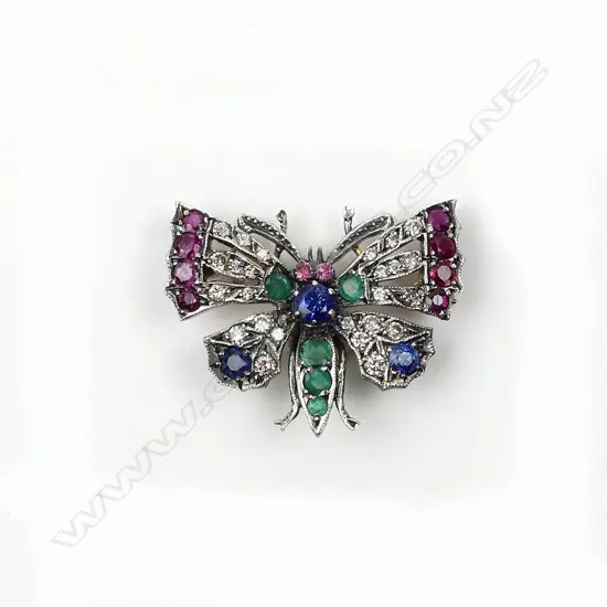 A multi-coloured gemstone encrusted butterfly brooch