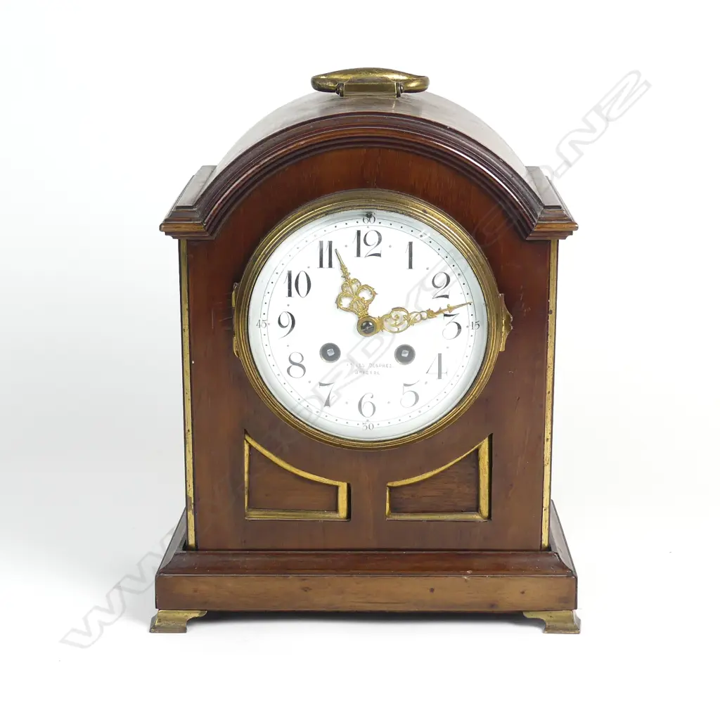 An Edwardian mahogany cased mantel clock of bracket type form Image 1++