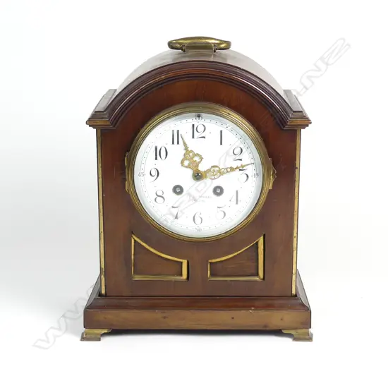 An Edwardian mahogany cased mantel clock of bracket type form