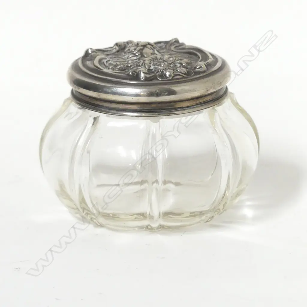An Art Nouveau silver topped glass vanity jar Image 1++