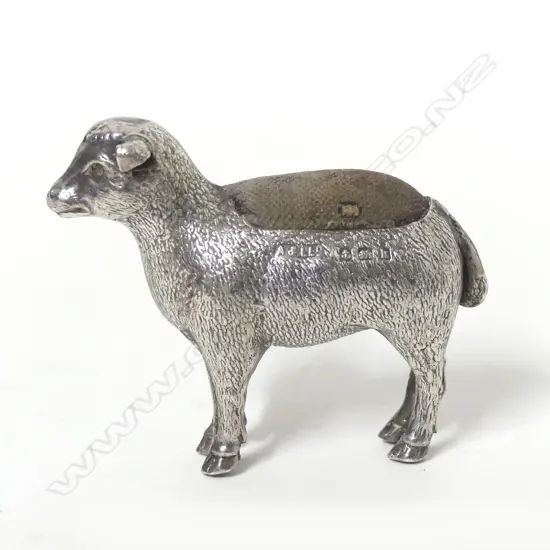 An uncommon Edwardian silver sheep shaped pin cushion
