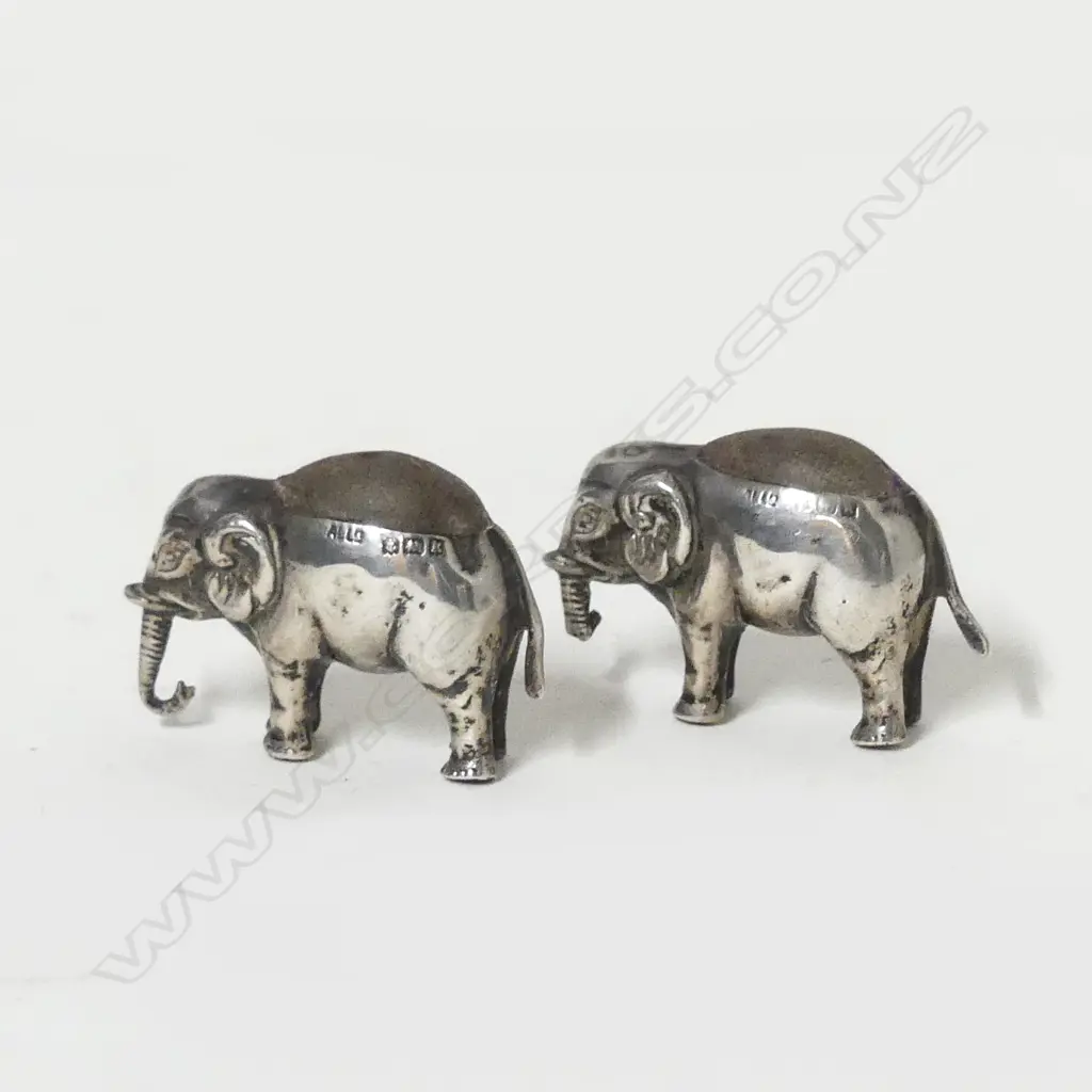 Two Edwardian silver elephant pin cushions Image 1++