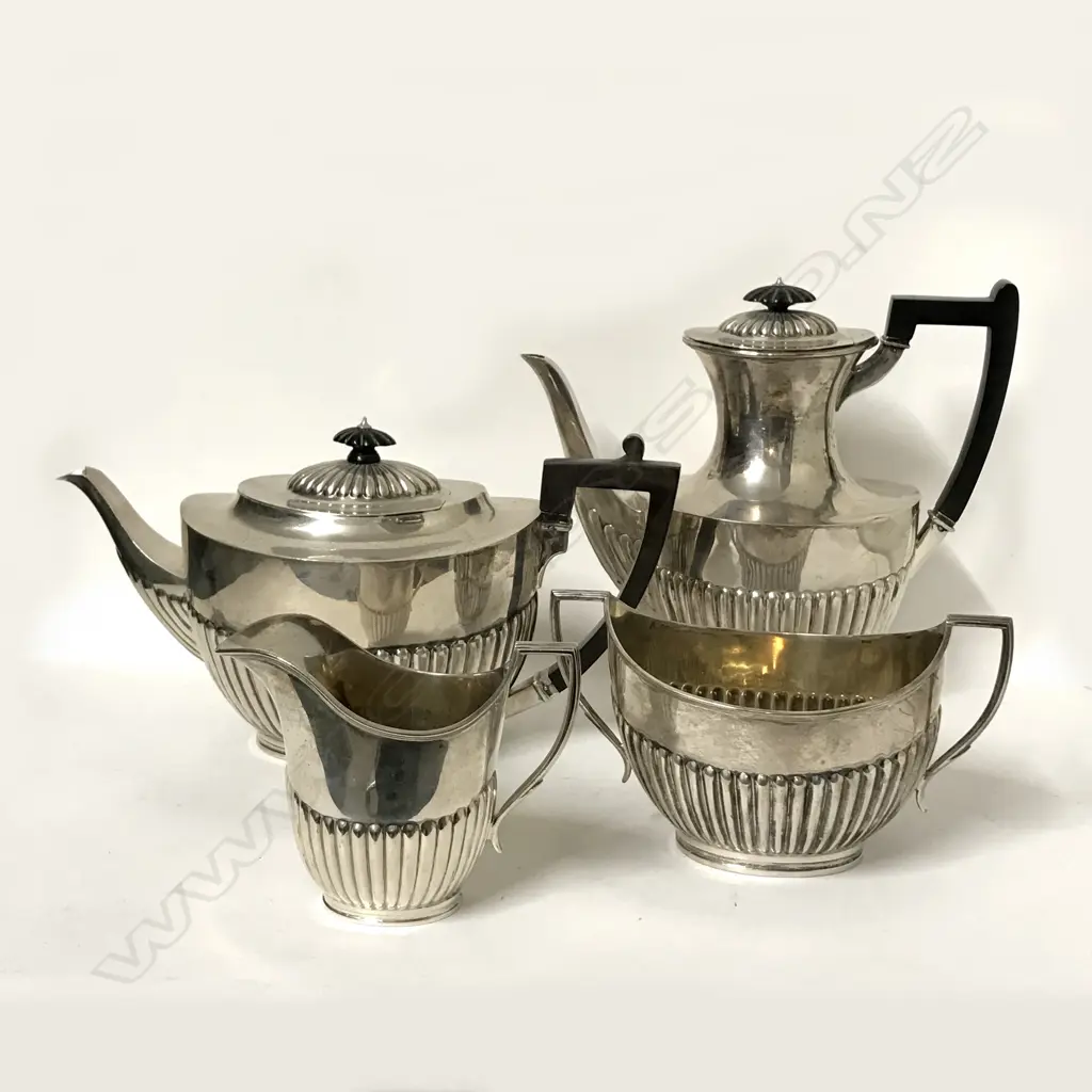A four-piece Georgian Revival tea and coffee service Image 1++