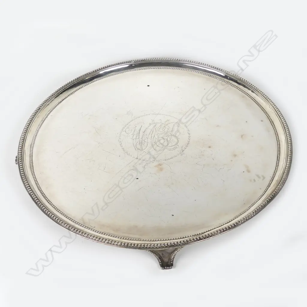 A large George III silver circular tray Image 1++