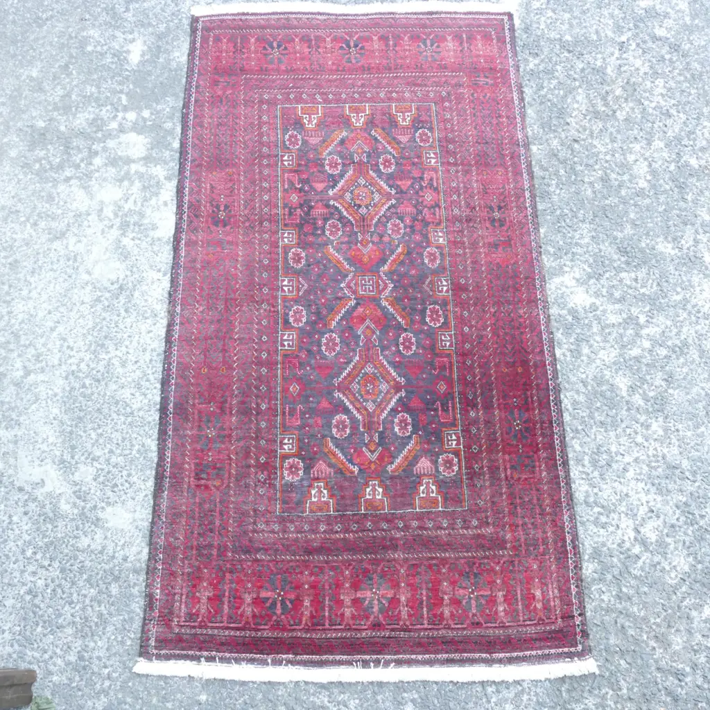 A Baluchi hand knotted carpet Image 1++