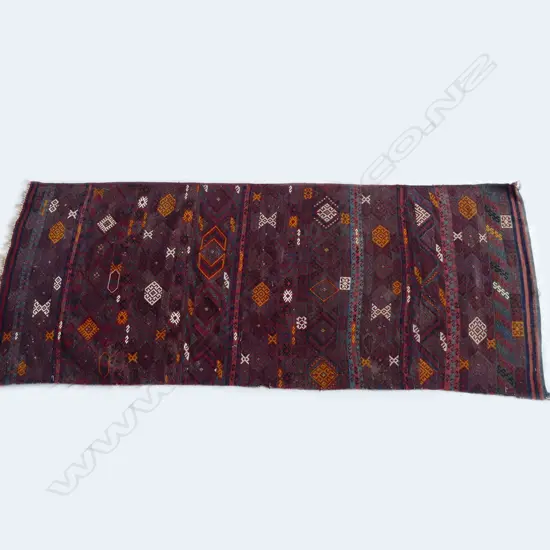 A Persian kilim small runner