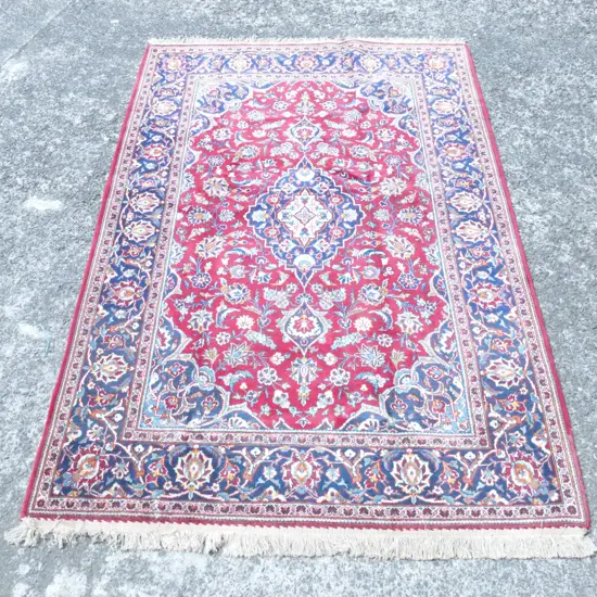 An Iranian Kashan hand knotted carpet