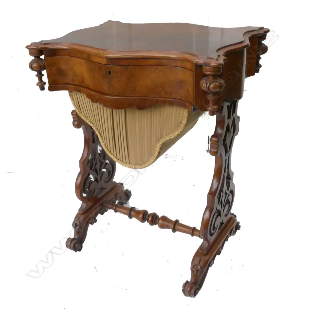 A Victorian walnut work table Image 1++