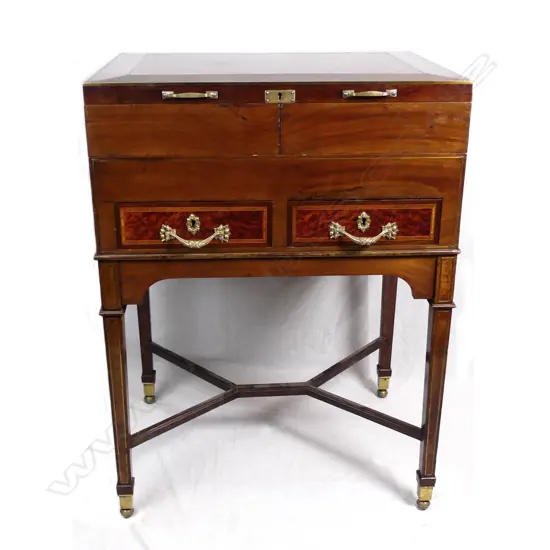 An early 1900s Continental mahogany vanity/dressing chest on stand