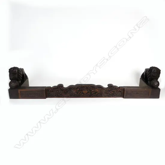 A Chinese inspired wooden fire fender