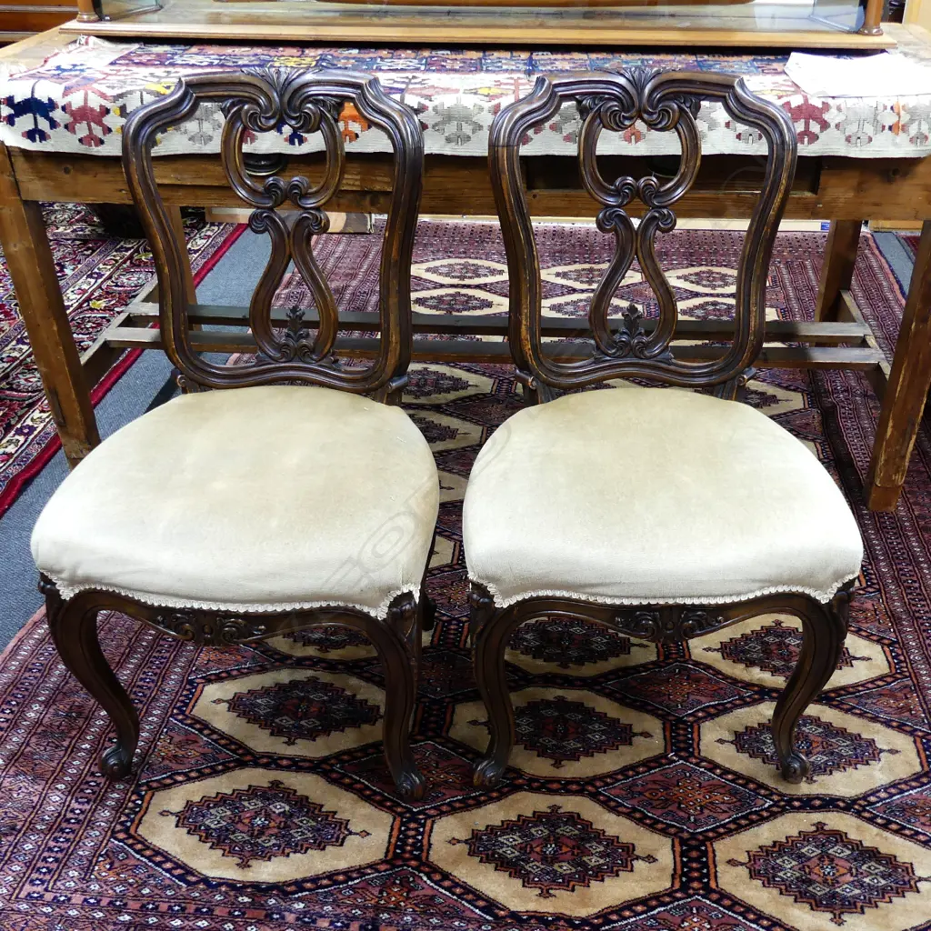 A pair of Victorian walnut dining chairs Image 1++