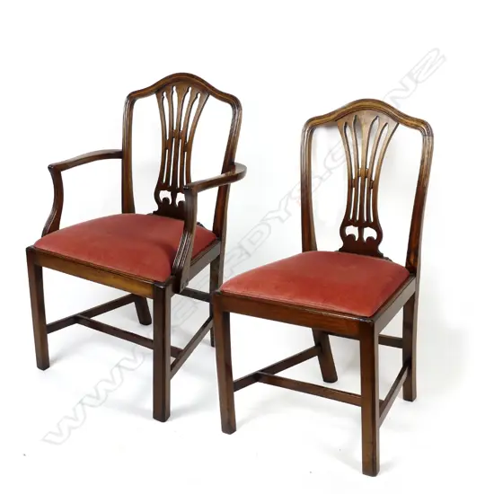 A set of eight Georgian mahogany Hepplewhite style dining chairs