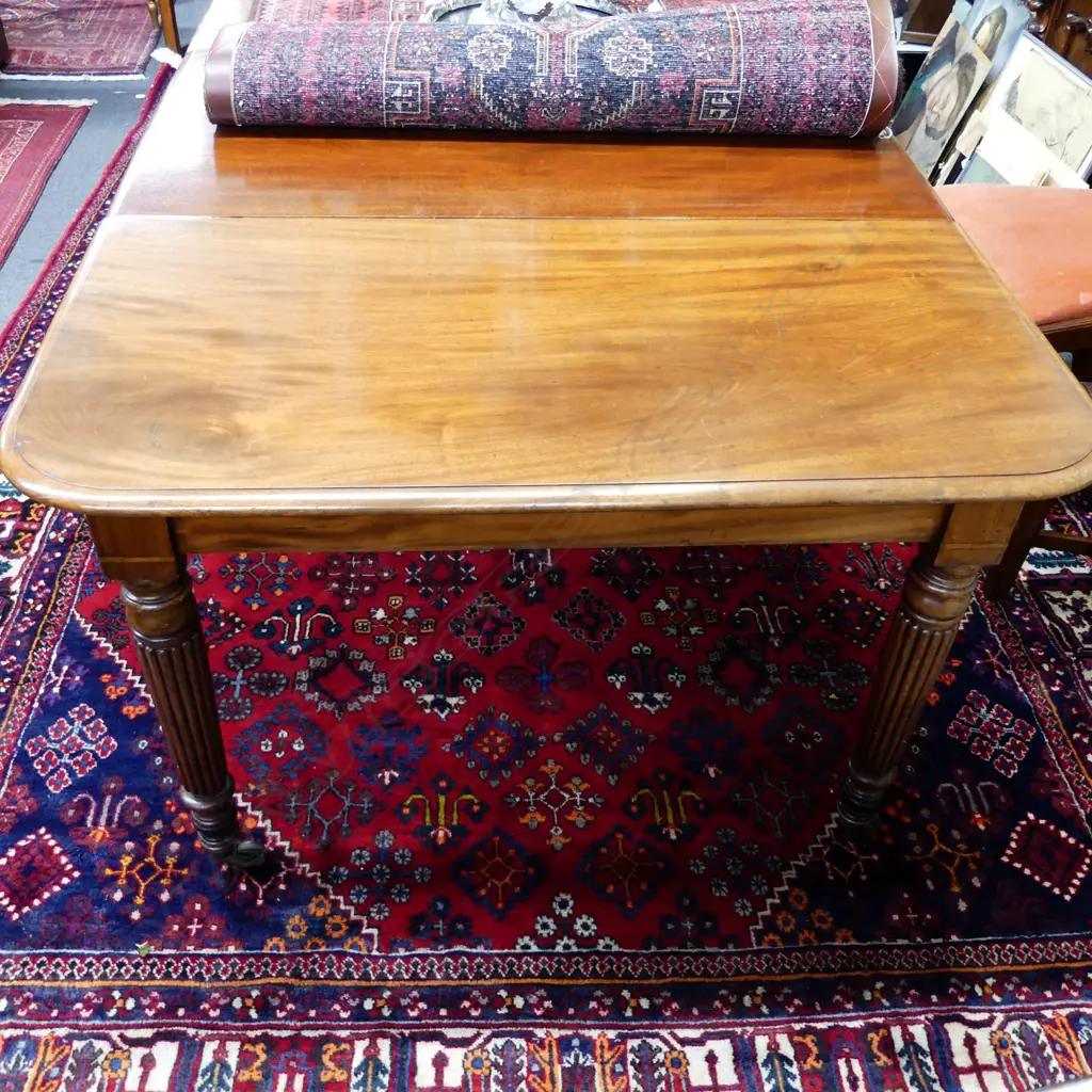 A Regency mahogany banquet dining table Image 1++