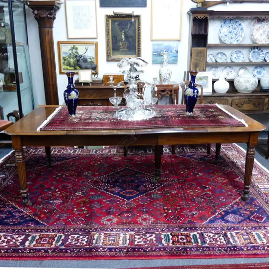 A Regency mahogany banquet dining table