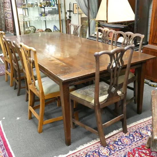 An oak French provincial country style dining table