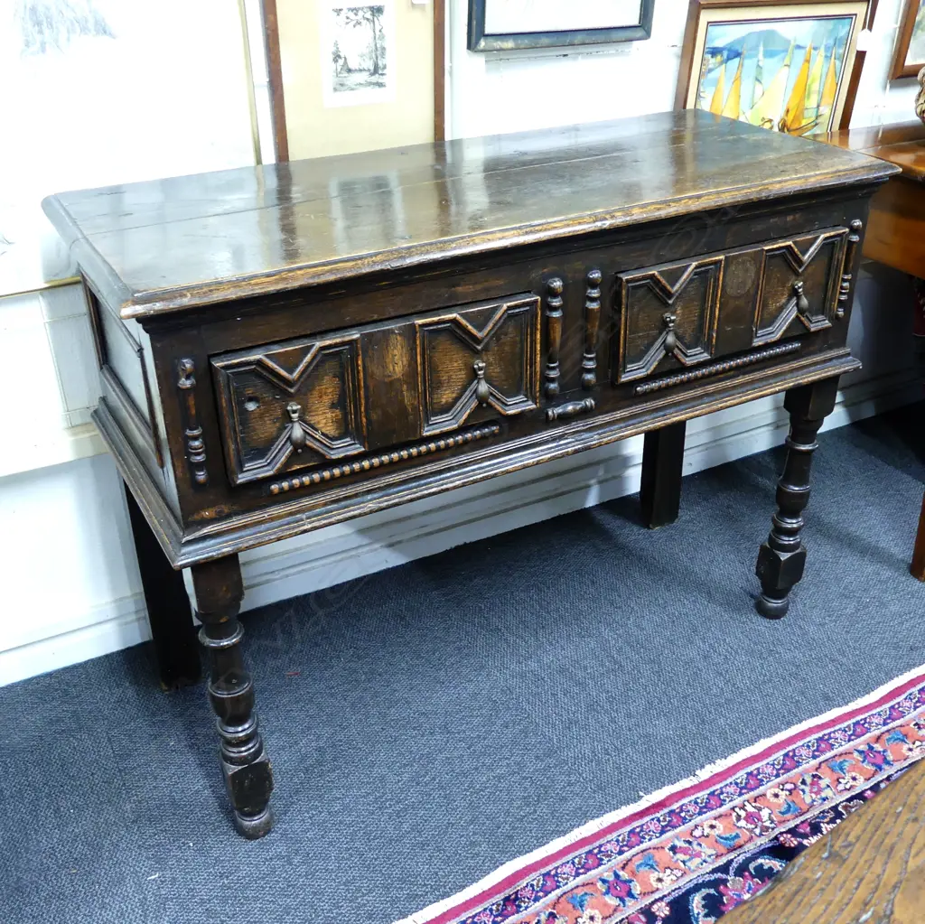 An oak Jacobean style dresser base Image 1++