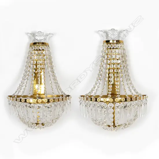 A pair of crystal wall sconces