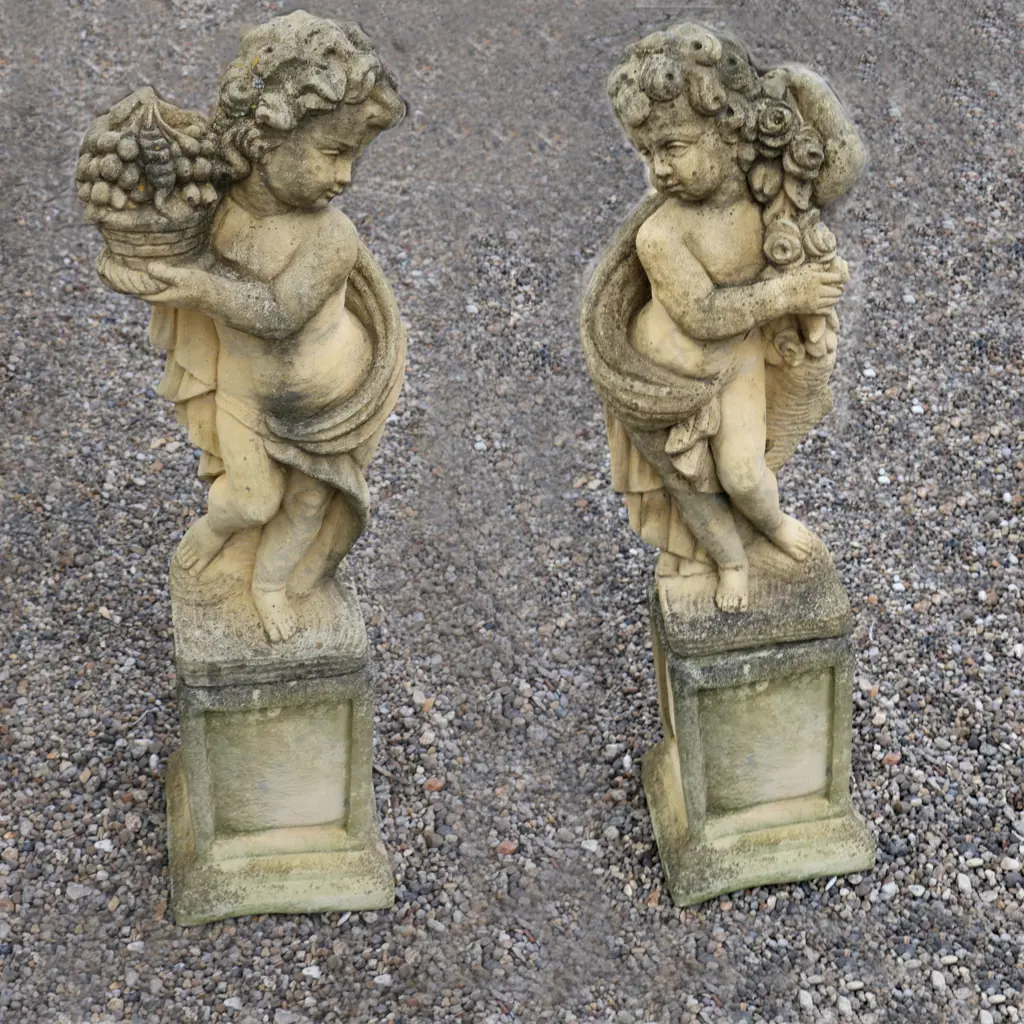 A pair of Church Stone garden statues on plinths Image 1++