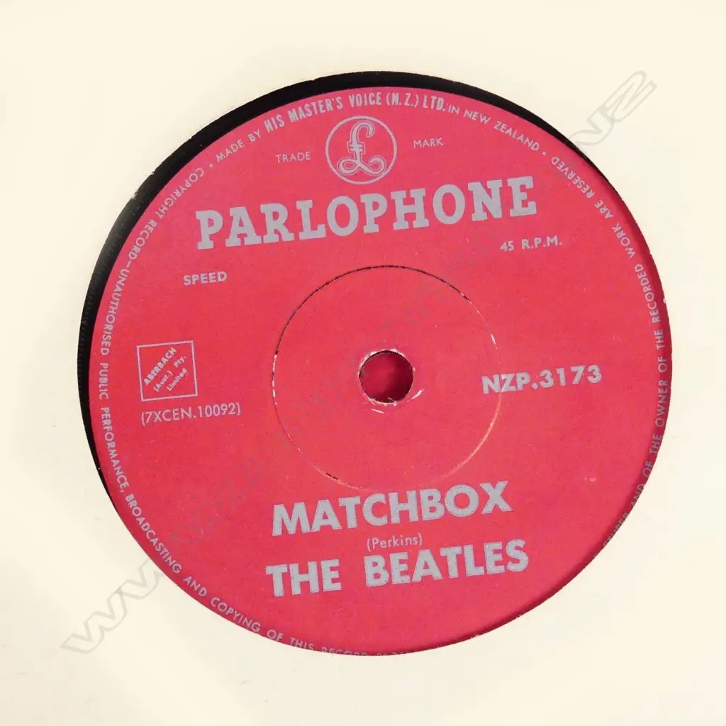 Record album with twelve early Beatles singles Image 1++