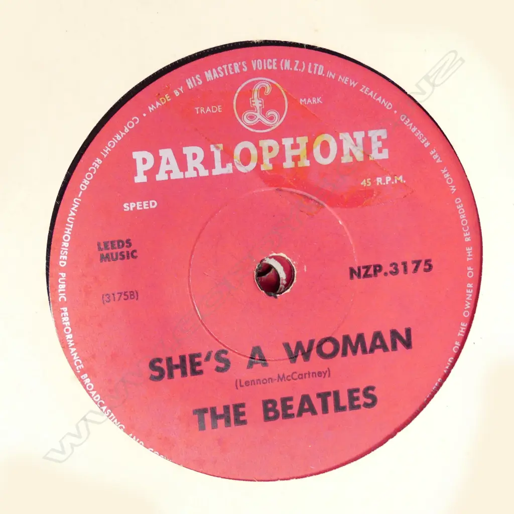 Record album with twelve early Beatles singles Image 1++