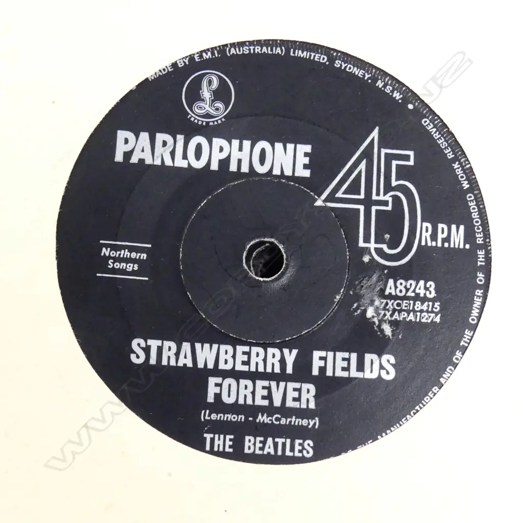 Record album with twelve early Beatles singles Image 1++