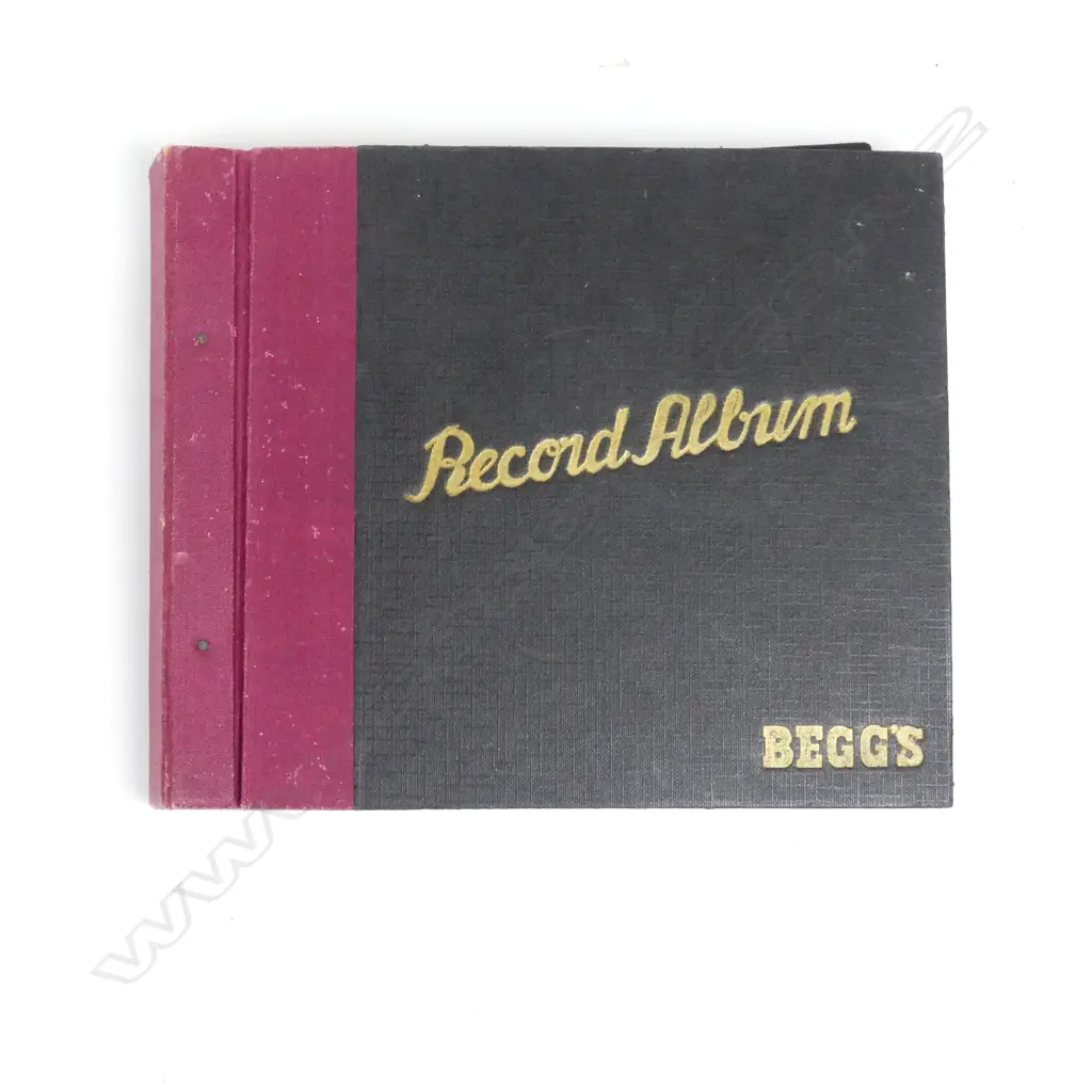 Record album with twelve early Beatles singles Image 1++
