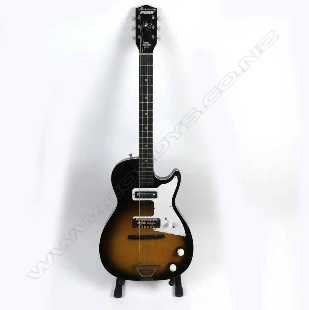 A Harmony Stratotone electric guitar Image 1++